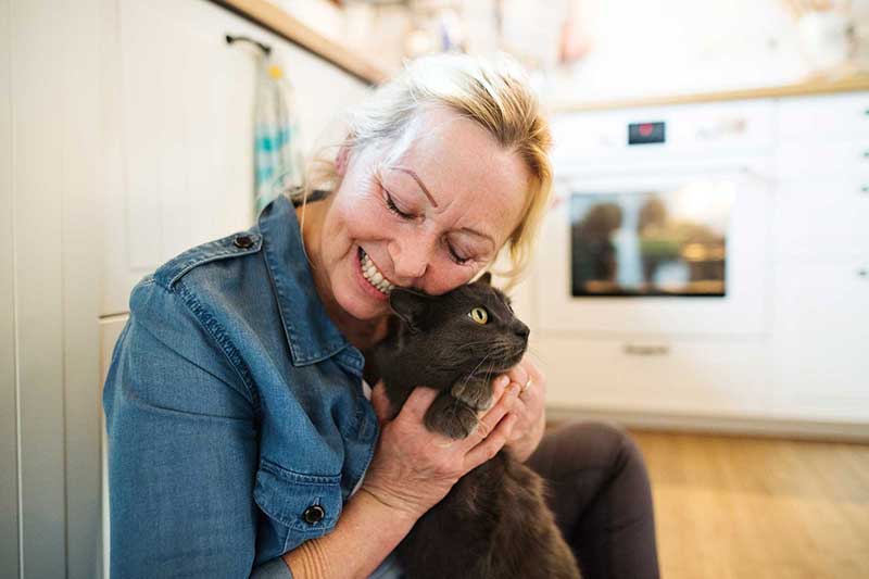 Lady holding her cat